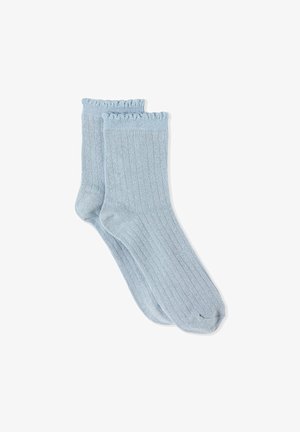 Chaussettes bleu clair côtelées avec une texture douce, dotées d'un bord festonné et d'une coupe ajustée, adaptées à un usage décontracté.