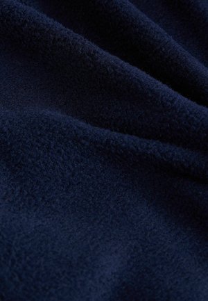 Navy blue fleece fabric with a soft, textured surface, displaying ripples and folds, suitable for warmth and comfort.