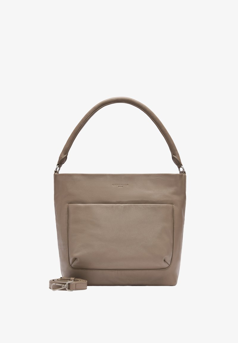 Lederhandtasche in Taupe mit strukturierter Form, ausgestattet mit einer Vorderfronttasche, einem kurzen Griff und einem verstellbaren Schulterriemen.
