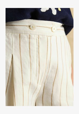 Cream-colored fabric featuring thin, horizontal stripes in light brown. Waistband secured with two white buttons. Pleated design detail.