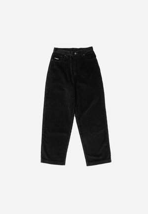 Pantalon en velours côtelé noir avec une taille haute, des jambes larges, et un logo discret sur la poche avant. Texture douce avec des rainures verticales distinctes.