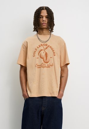 T-shirt con stampa - salmon