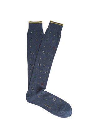 Calze al ginocchio blu navy realizzate in materiale morbido, decorate con un motivo giocoso di punti verdi, rossi, gialli e grigi, con un risvolto a righe gialle.