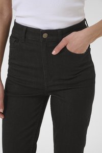 High-waisted black denim jeans with a classic design, featuring a front pocket and a metal button closure. Smooth texture and slim fit.