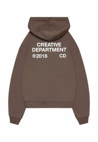 Brown hoodie with a kangaroo pocket and drawstring hood. Features white printed text: "CREATIVE DEPARTMENT ®2018 CD" on the back.