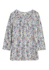Blusa floreale a maniche lunghe con scollo rotondo, in tessuto leggero, e una stampa multicolore di fiori rosa, verdi e blu su uno sfondo chiaro.