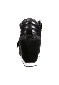 Black sneaker with a textured suede heel and glossy upper, featuring a padded collar and white sole. Adjustable strap at the back.
