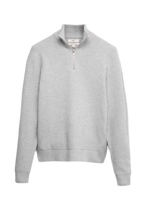 Lys grå, ribbet pullover med lynlås i kraven. Har lange ærmer og et tætsiddende bund. Lavet af blødt strikmateriale.