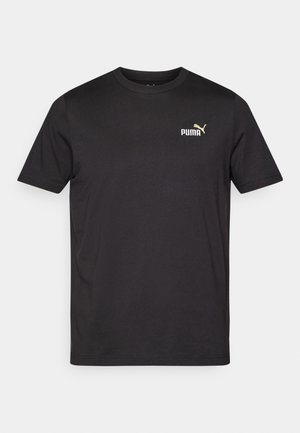 Svart t-shirt i bomull med korta ärmar, rund hals och en gul PUMA-logotyp på vänster bröst. Enkelt, enfärgat design utan mönster.
