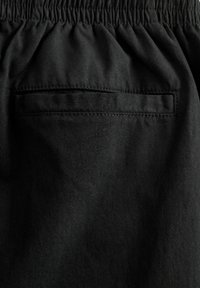 Next REGULAR FIT-ELASTICATED WAIST DRAWSTRING TAPERED - Chino-püksid - black