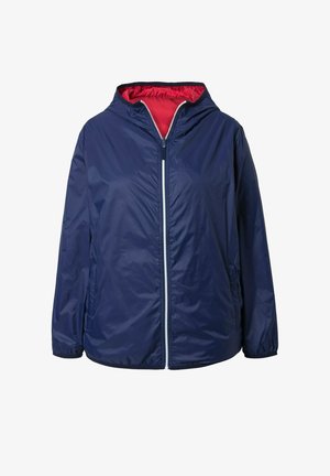 Navyblå hættejakke med hvid lynlås foran, elastiske ærmekanter, sidelommer og rød inderforing.