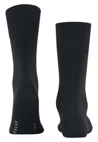 Schwarze Socken mit gerippten Bündchen, glatter Textur sowie verstärkten Zehen- und Fersenbereichen. Das "Falke"-Logo ist in der Nähe des Knöchels sichtbar.