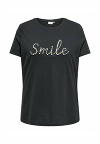 Juodas trumpomis rankovėmis marškinėliai su "Šypsena" grafika, pagaminta iš perlų primenančių karoliukų, užrašyta kursyvu priekyje.