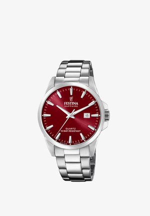 Orologio da polso in metallo argentato con quadrante rosso, indici orari bianchi, datario alle ore 3 e movimento al quarzo con resistenza all'acqua di 10 bar.