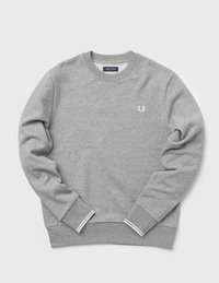 Felpa grigia in misto cotone, con scollo rotondo, polsini a coste con dettagli a righe bianche e un piccolo logo sul petto.