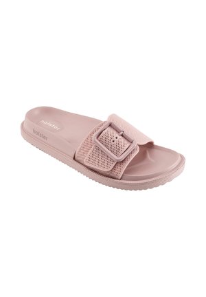 Sandalo rosa slip-on con cinturino regolabile a fibbia testurizzata, supporto plantare sagomato e suola scanalata, marchiato "holster" sul lato e sul plantare.