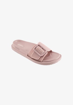 Sandalo rosa slip-on con cinturino regolabile a fibbia testurizzata, supporto plantare sagomato e suola scanalata, marchiato "holster" sul lato e sul plantare.