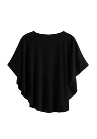 Black loose-fitting top with a round neckline, wide sleeves, and a flowing silhouette. Made from soft fabric with a smooth texture.