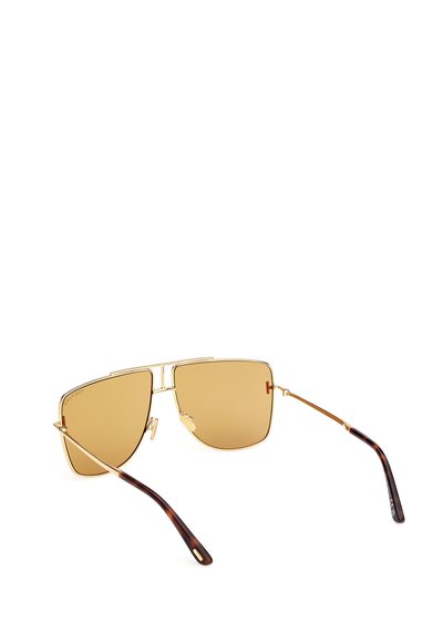 Solglasögon med guldfärgad metallram, fyrkantiga linser, brun toning och armar med sköldpaddsmönster. Har justerbara näskuddar och minimal hårdvara.