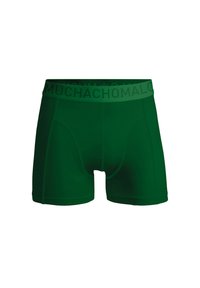 Gröna kalsonger med mjuk midja som har varumärket "MUCHACHOMALO". Slät textur med en åtsittande design och inga mönster.