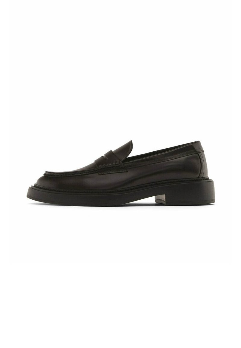 Black leather loafers with a smooth texture, a rounded toe, and a slightly elevated block heel. Features subtle stitching details on the upper.