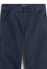 Navy blue cotton carpenter pants featuring a flat waistband, front pockets, and side pocket detail. Smooth fabric with a subtle sheen.
