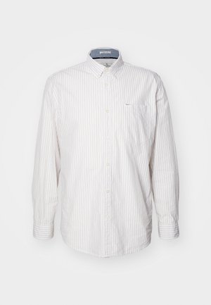 Lysfarvet langærmet skjorte med tynde lodrette striber. Har en button-down krave og en brystlomme. Lavet af et tekstureret stof.