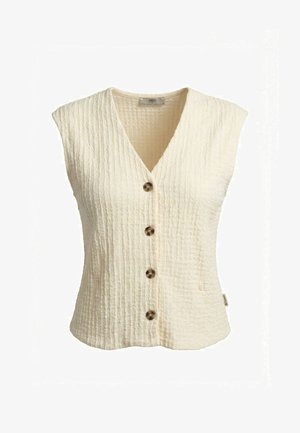 Veste sans manches texturée couleur crème avec col en V et quatre boutons marron sur le devant, avec une petite étiquette latérale.