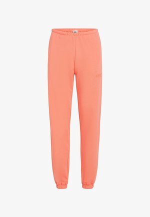 Cotton jogger pants in bright coral, featuring an elastic waistband, tapered legs, and stitched detailing along the sides.