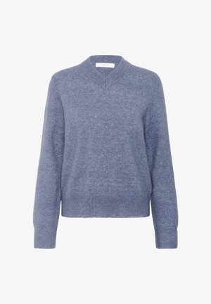 Svijetloplava dukserica izrađena od mekog, teksturiranog materijala. Ima duboki V-izrez i duge rukave s rebrastim manžetama i rubom.