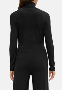 comma Sweter
