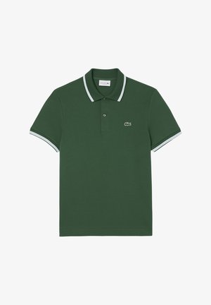 Temnozelena polo majica iz prozračnega bombažnega materiala, z belimi robovi na ovratniku in rokavih ter majhnim vezenim logotipom na prsih.