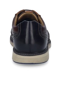 Herrenlederschuhe, dunkelmarineblau mit braunen Akzenten, runde Form, Brogue-Details, gestickte Außensohle, strukturierte Gummisohle für besseren Halt.