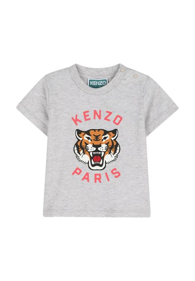 T-shirt en coton gris avec un graphique de tête de tigre et le texte "KENZO PARIS" en rouge. Conçu avec des manches courtes et des accents à boutons-pression.