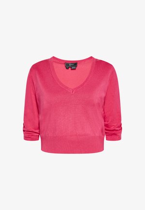 Rózsaszín V nyakú, crop fazonú pulóver háromnegyedes ujjal, sima anyagból készült, szűk szabású deréknál, diszkrét fényű.