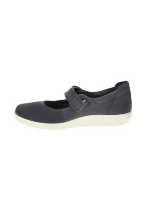 Black Mary Jane shoe with adjustable strap and white sole, designed for casual or comfort wear.