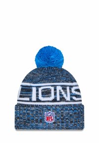 Strickmütze in Blau und Grau mit einem weißen "LIONS"-Bündchen. Sie verfügt über einen blauen Pompon oben und ein NFL-Logo-Patch am Bund.