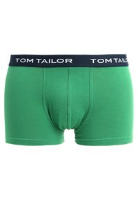 Grüne Baumwoll-Boxershorts mit einem marineblauen elastischen Bund, der das "TOM TAILOR"-Logo trägt. Glatte Textur, körpernaher Schnitt und mittellange Passform.