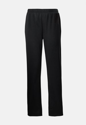 Pantalon de survêtement noir taille élastique, jambe droite avec un logo embossé discret sur la cuisse supérieure gauche.