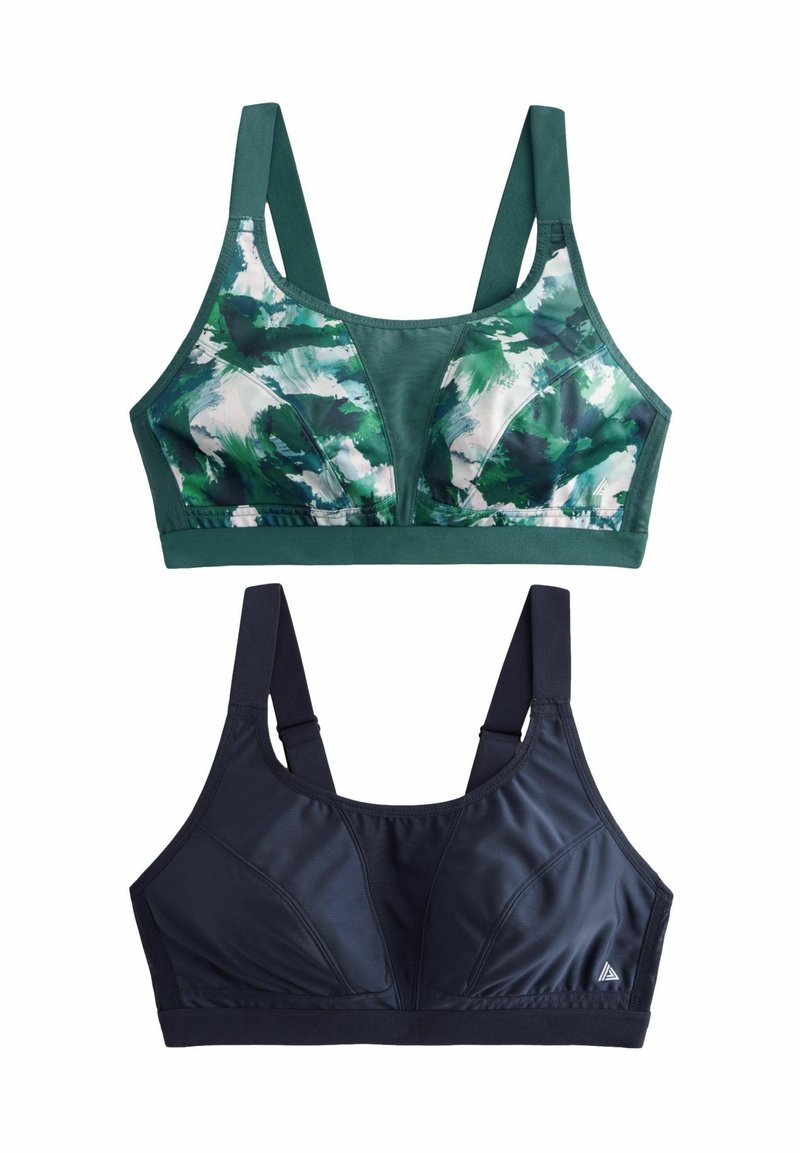 Due reggiseni sportivi: uno presenta un motivo astratto verde e bianco; l'altro è di un blu navy uniforme. Entrambi hanno spalline larghe e un design supportivo.