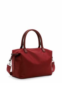 Raudona nailono rankinė su rudais odiniais akcentais, dviem rankenomis ir nuimamu pečių dirželiu. Viršus su užtrauktuku, užtikrinančiu saugų uždarymą.