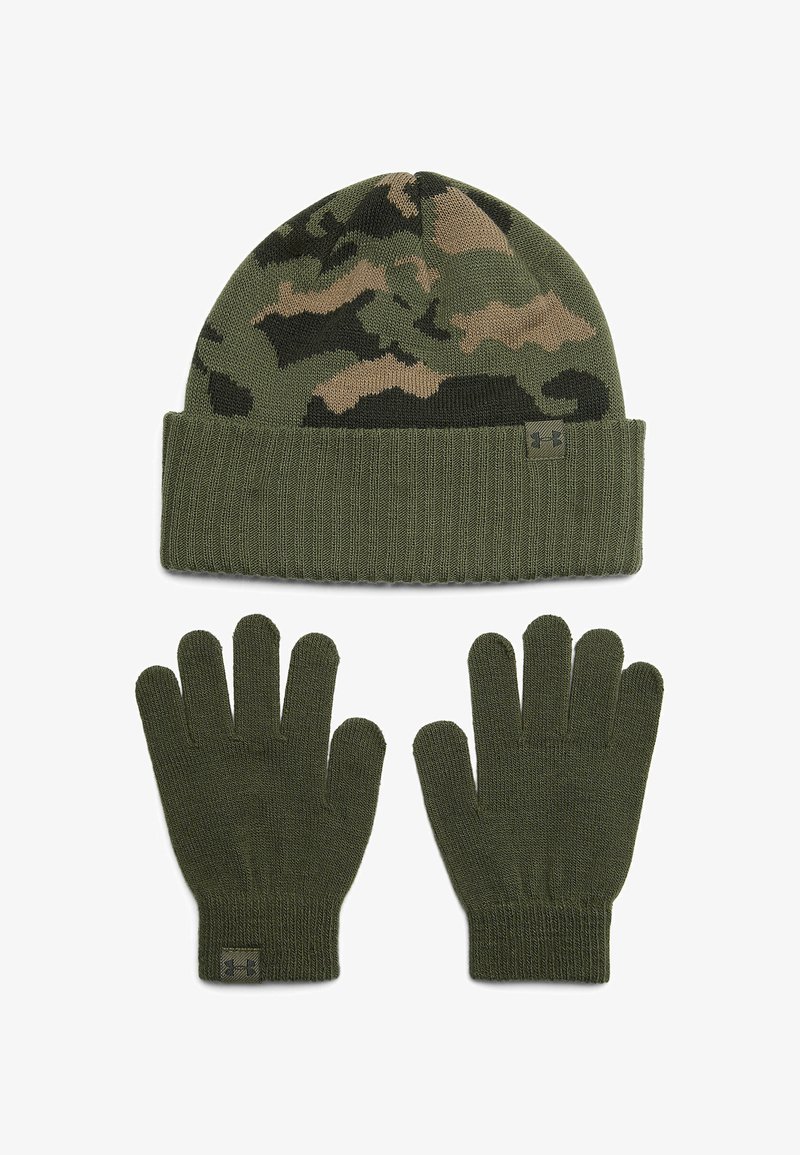 Camo-patterned green knit beanie with ribbed brim and matching green gloves featuring a cuff. Both items are made of a soft knit fabric.