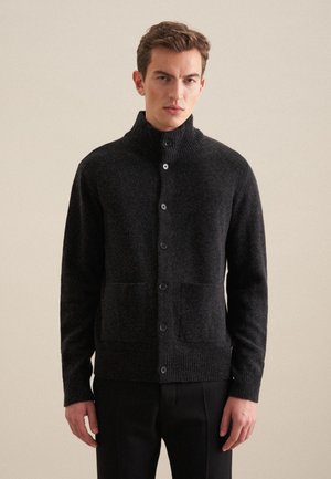Dark gray knit cardigan with a high collar, button closure, and two front pockets. Features ribbed cuffs and hem with a textured finish.