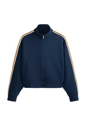 Navy blue zip-up jacket with high collar, side pockets, and beige and white stripes running down both sleeves.