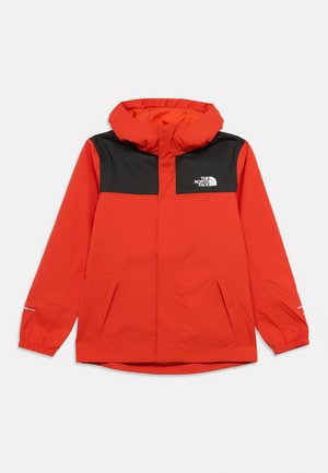 Red waterproof jacket with a black upper section, adjustable hood, elastic cuffs, side pockets, and a logo on the chest.