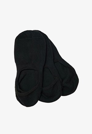 Trois paires de chaussettes noires basses invisibles empilées sur un fond blanc.