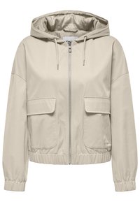 Světle béžová bunda s kapucí, která má plný zip, dvě přední kapsy, elastické manžety a šňůrku na kapuci. Hladká textura.