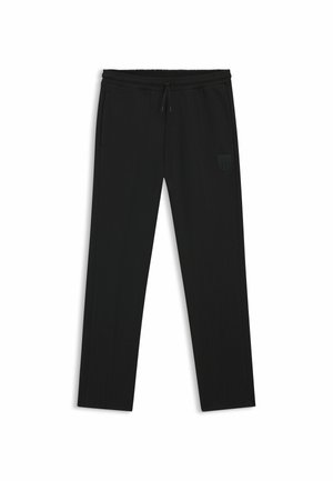 Czarne sportowe spodnie z sznurkiem w pasie, ozdobione subtelną pionową teksturą w paski oraz małym czarnym logo na lewym kieszeni.