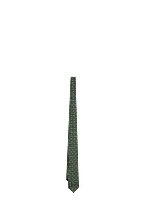 Corbata verde con un patrón de pequeñas formas circulares blancas y naranjas, distribuidas uniformemente por toda la tela.
