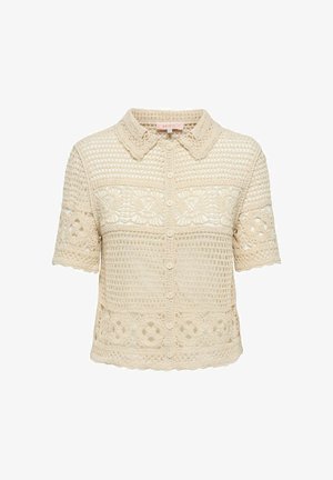 Beige kortermet heklet skjorte med knapper, med blomster- og geometriske mønstre og klassisk krage.